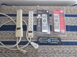 lot 71 image: Universal remotes and power strips...