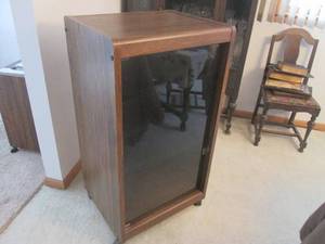 lot 95 image: Glass front Sullivan cabinet on whe...