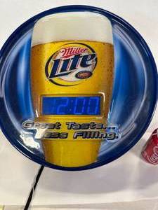 lot 16 image: Miller Lite Clock 18 Inches Wide