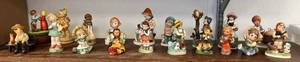 Shelf Full Of Misc. Antique Figurines