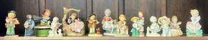 Shelf Full Of Misc. Antique Figurines