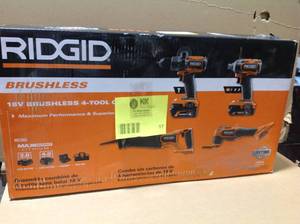 RIDGID 18V Brushless Cordless 4-Tool Combo Kit with (1) 4.0 Ah and (1) 2.0 Ah MAX Output Batteries, 18V Charger, and Tool Bag, Customer return, Review all pictures