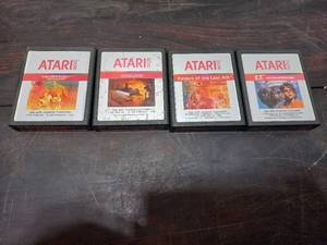 lot 21 image: Atari 2600 Games E.T., Raiders Of The Lost Ark, Vanguard, Swordquest EarthWorld
