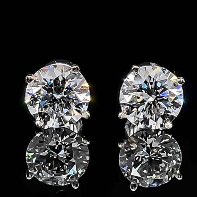 Solitaire 11.66 Carat Diamond Stud Earrings in Platinum at