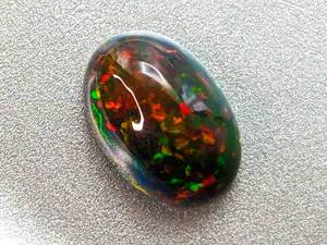 1.37 Carat Black Natural Welo Opal Gemstone