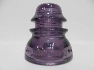 lot 12 image: Whiteall Tatum CD No. 1 Purple Glass Insulator