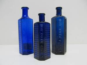 lot 77 image: 3 Antique Embossed Cobalt Blue Glass Poison Bottles