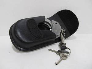 lot 219 image: Nice Pair of Police Handcuffs wLeather Case
