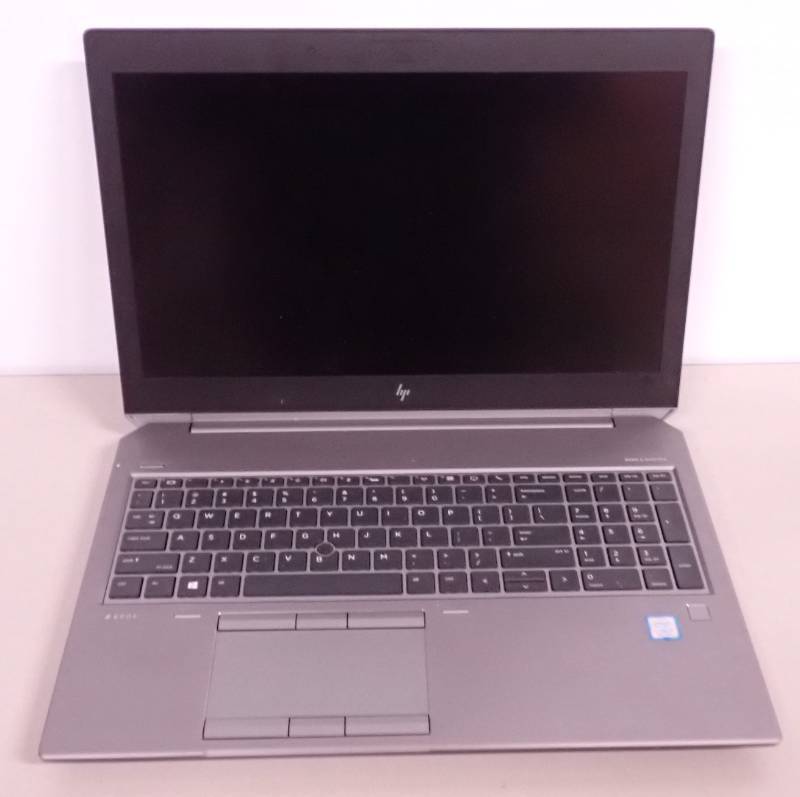 lot 33 image: HP ZBook 15 G5 Notebook  Intel Core I7-8850H CPU  2.60GHz  32GB DDR4 RAM (2x 16GB)  NO HD  NO OS  15.6 with 1920 x 1080 resolution  FHD Anti-glare  Quadro P2000  Includes USB-C, VGA &amp Power Adapter Cords