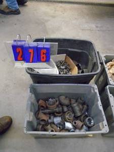 lot 276 image: Qty of 2 bins of pipe fittings. 14 up to 2. AS shown.