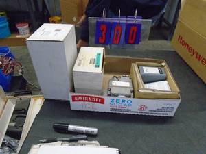 lot 300 image: White Rogers 36C74227 & Honeywell H205A1012. As shown.