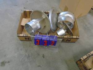 lot 332 image: Misc chimney caps Look like stainless. As shown.