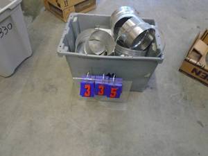 lot 335 image: Misc chimney adapters. Look like stainless. As shown.