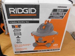 lot 29 image: RIDGID 6 Gallon 3.5 Peak HP NXT WetDry Shop Vacuum with Filter, Locking Hose and Accessories