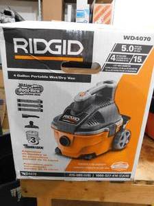 lot 31 image: RIDGID 4 Gallon 5.0 Peak HP Portable WetDry Shop Vacuum with Fine Dust Filter, Locking Hose and Accessories