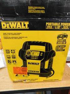 lot 32 image: DEWALT 1400 Peak Amp Portable Car Jump Starter with Digital Compressor