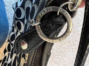 lot 55 image: Vintage Black Coach Purse with Beige C Design