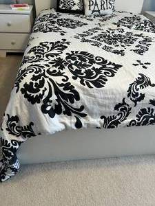 lot 61 image: IKEA MALM Double Sized White Frame Bed Located Upstairs