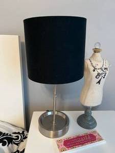 lot 64 image: Silver-Colored Lamp with Black Lampshade