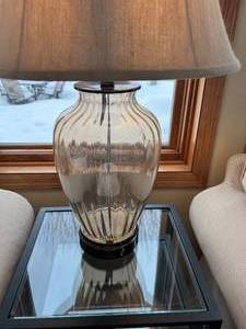 lot 121 image: Two Matching Cognac Glass Lamps with Beige Shades