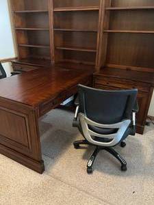 lot 102 image: Aspen Home Double Sided Wood Desk and Bookshelf Unit Located on Main Floor