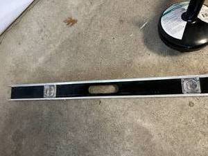 lot 167 image: 48 Metal Level and Canister Auger