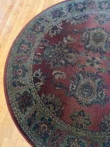lot 127 image: Circular Sphinx Kharma Rug