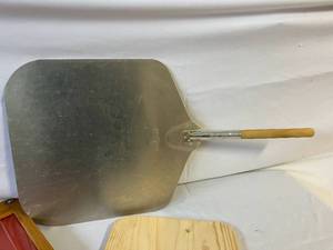 lot 153 image: Pizza Peels and New Cutting Board System