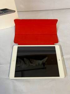lot 155 image: Apple iPad Air with Red Magnetic Cover