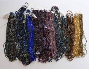 lot 18 image: Variety of Multi Packs Bugle Bead Strings