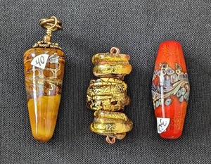 lot 16 image: Three Large Handblown Orange and Gold Art Glass Lampwork Beads