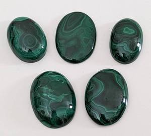 lot 54 image: Five Malachite Cabochons