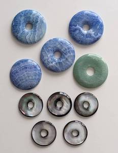 lot 60 image: Mother of Pearl and Calcite Stone Pendants
