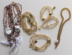 lot 67 image: Glass and Zircon Bead Strands
