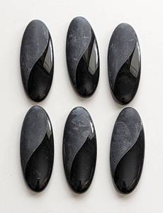 lot 69 image: Six Etched Black Obsidian Stones