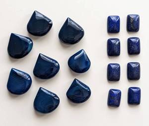 lot 74 image: Lapis Cabochons and Blue Chalcedony Beads