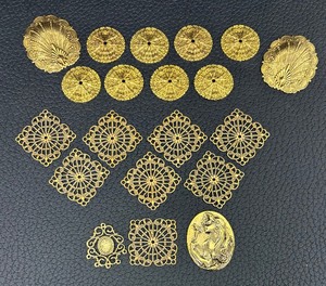 lot 230 image: Golden Embellishment Grouping