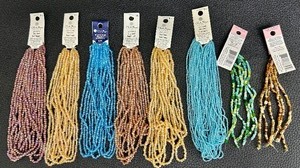 lot 168 image: Colorful Strands of Beads
