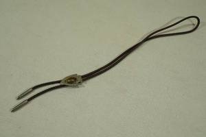 lot 95 image: Silver Tone Arrow Head Bolo Tie - Leather Strap, Tigers Eye Stone