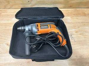 lot 113 image: RIDGID 8 Amp Corded 12 in. Heavy-Duty Variable Speed Reversible Drill with Carrying CaseStorage Bag