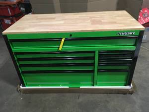 lot 19 image: Husky  52 in. W x 24.5 in. D Standard Duty 10-Drawer Mobile Workbench Tool Chest with Solid Wood Work Top in Gloss Green, Open Box, Review all pictures