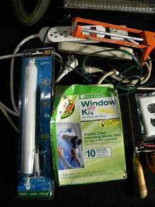 lot 148 image: Vintage Portable Heater Window Seal Kits Power Strips Caulking Supplies