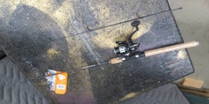 lot 111 image: NEW SOUTHBEND FISHING ROD AND REEL
