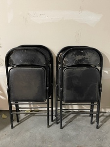 Four Matching Vinyl Folding Chairs