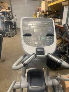 lot 4 image: Precor 835 EFX adjustable ramp elliptical with arms.