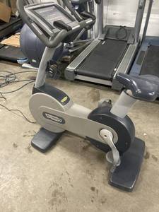 lot 8 image: Technogym Upright Bike     Cleaned and serviced by authorized tech.