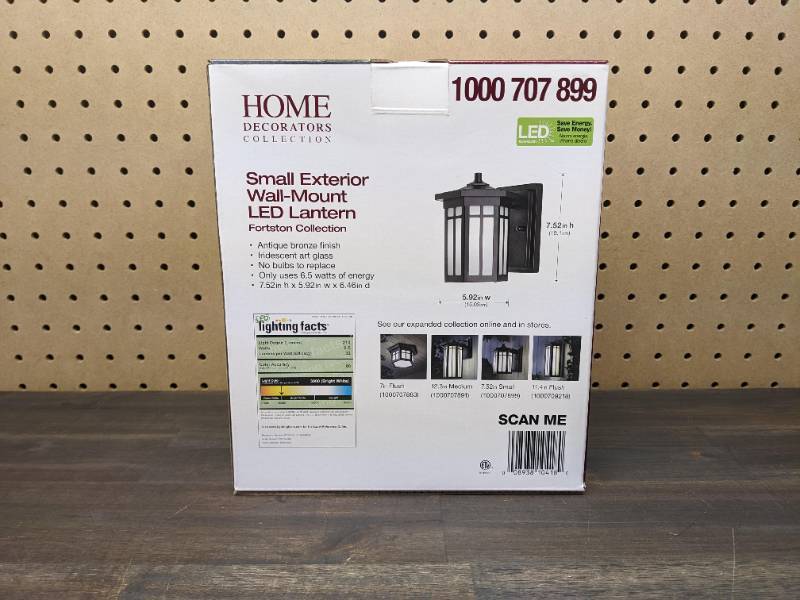 lot 40 image: New Home Decorators Collection Antique Bronze Outdoor LED Wall Lantern Sconce