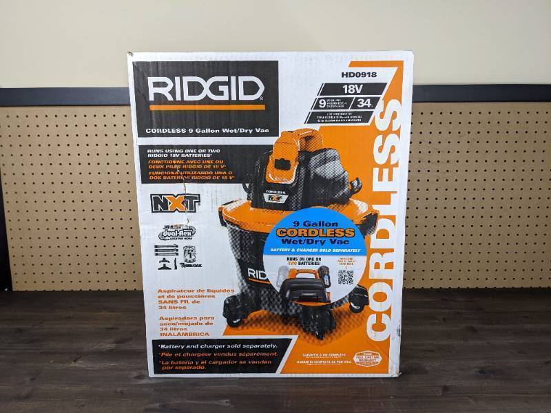 lot 108 image: New RIDGID 9 Gal. 18-Volt Cordless NXT WetDry Shop Vacuum with Filter Hose and Accessories