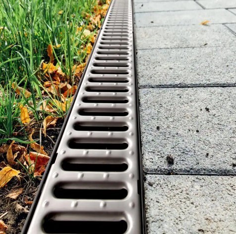 lot 170 image: (6) RELN Storm Drain 40 in. Channels Complete with Galvanized Grates, (11) Joiner Pieces, and Screws