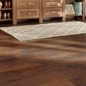 lot 165 image: 6 Cases of TrafficMaster Hand scraped Saratoga Hickory 7 mm Thick x 7-23 in. Wide x 50-58 in. Length Laminate Flooring (24.17 sq. ft.  case)